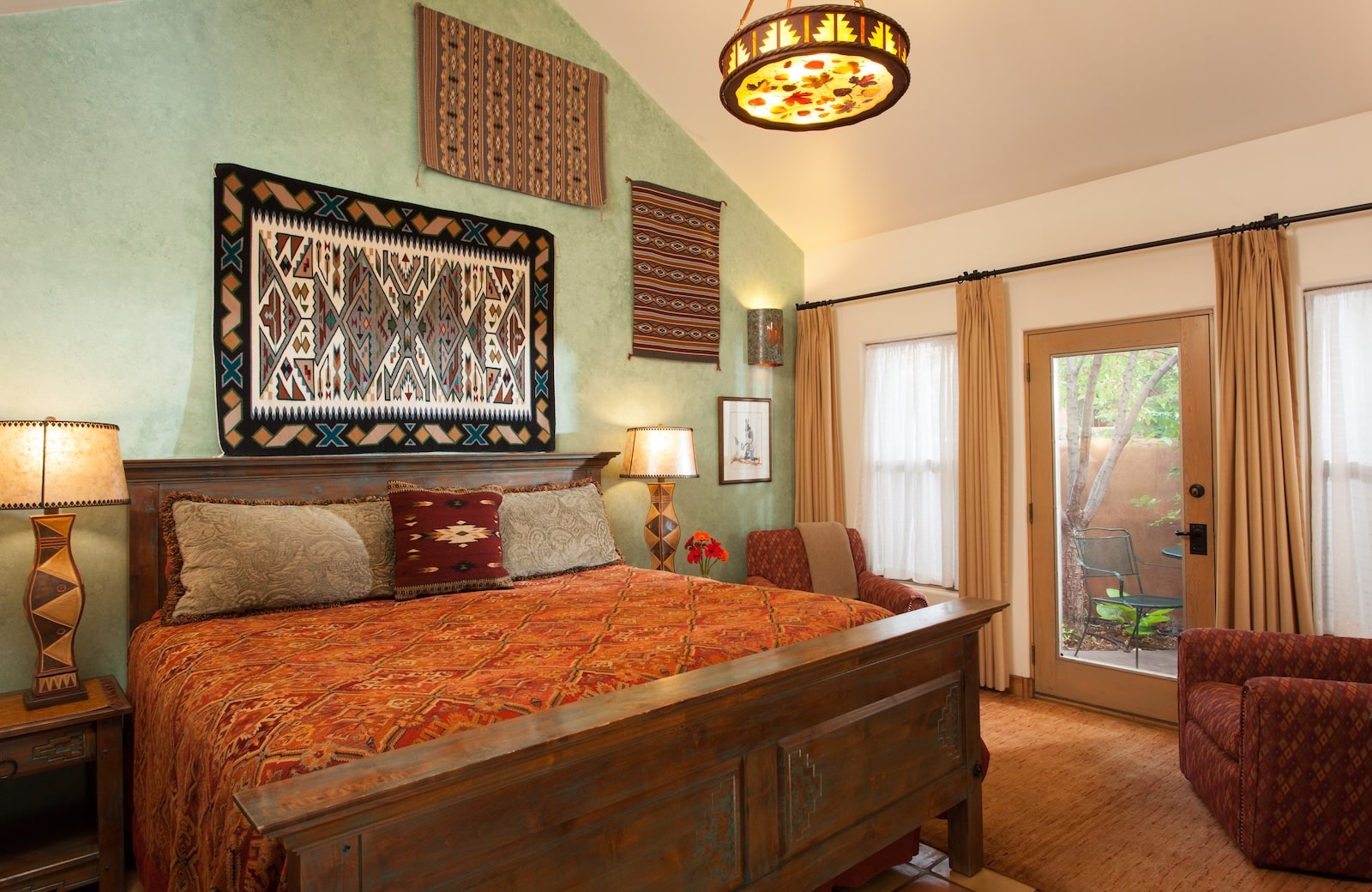 At our Santa Fe Lodging enjoy spacious guest suites with king sized bed, stunning decor, and private patios. 