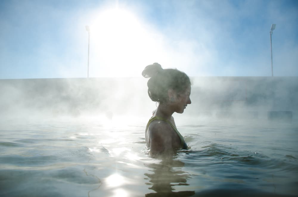 A woman enjoying the healing waters of Santa Fe hot springs