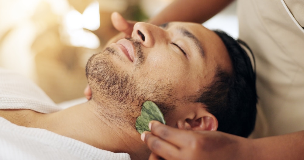 A man enjoying a facial treatment at a Santa Fe Day Spa near our Bed and Breakfast