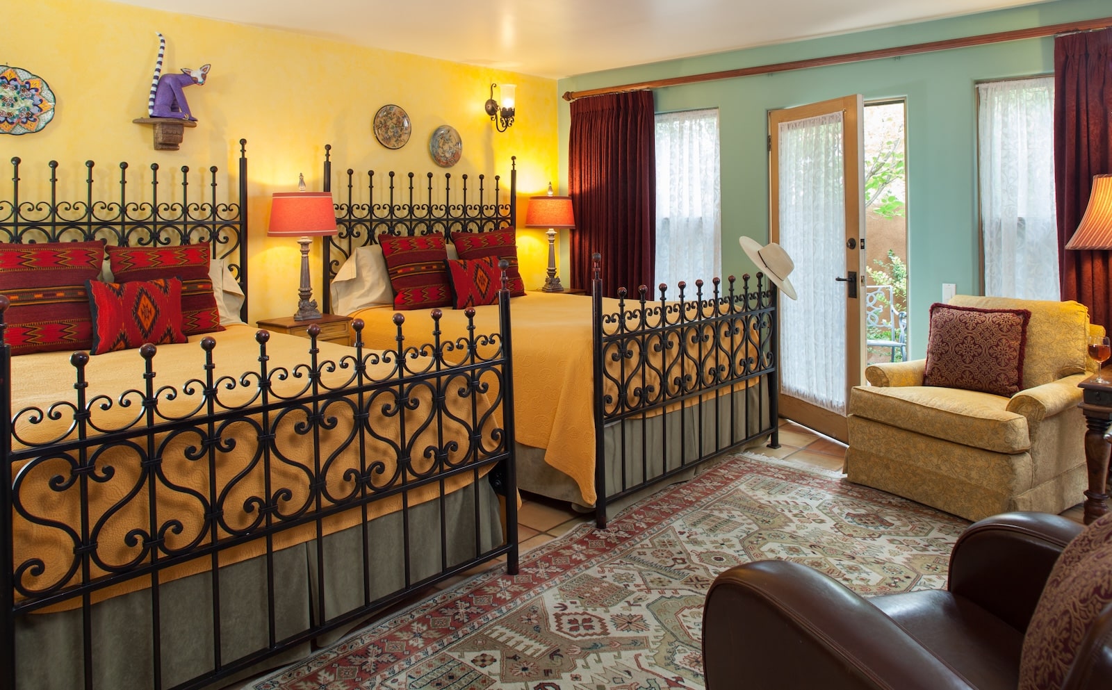 Spacious rooms like this one with 2 queen beds is one reason we're one of the best Family-Friendly Places to Stay in Santa Fe. 